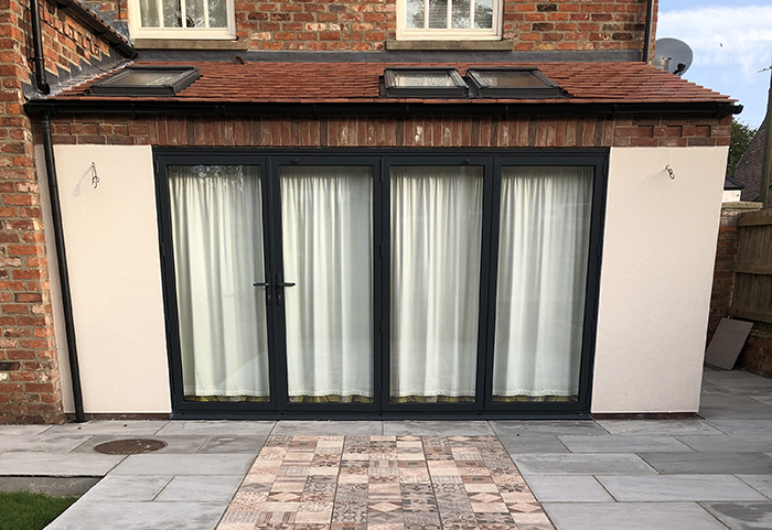 Extension Square home extension with bifold doors